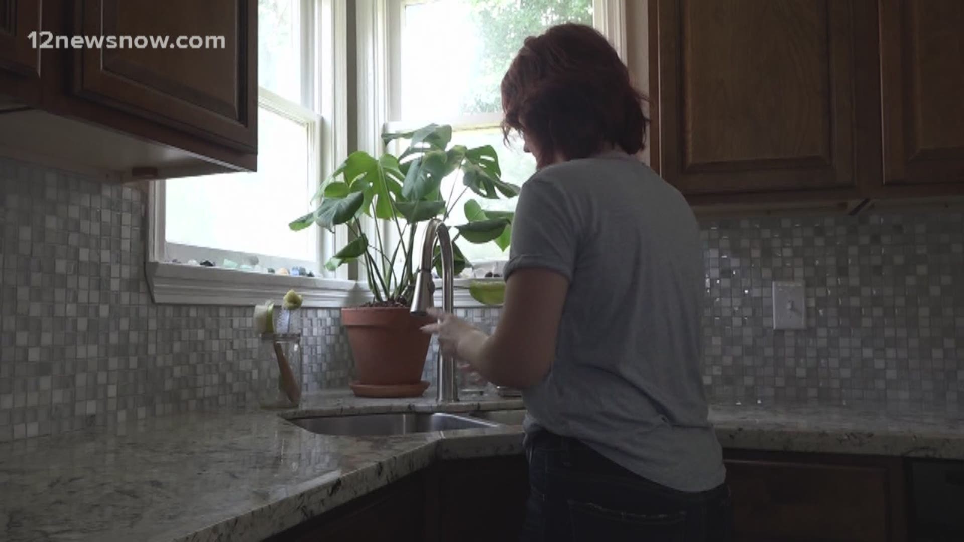 One woman said she noticed the brown water when she was watering her plants.