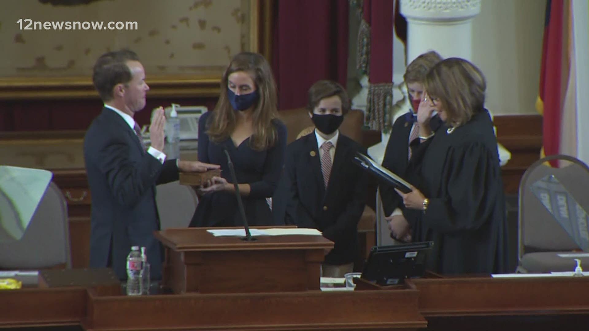 Phelan took the oath with his wife and four sons at his side