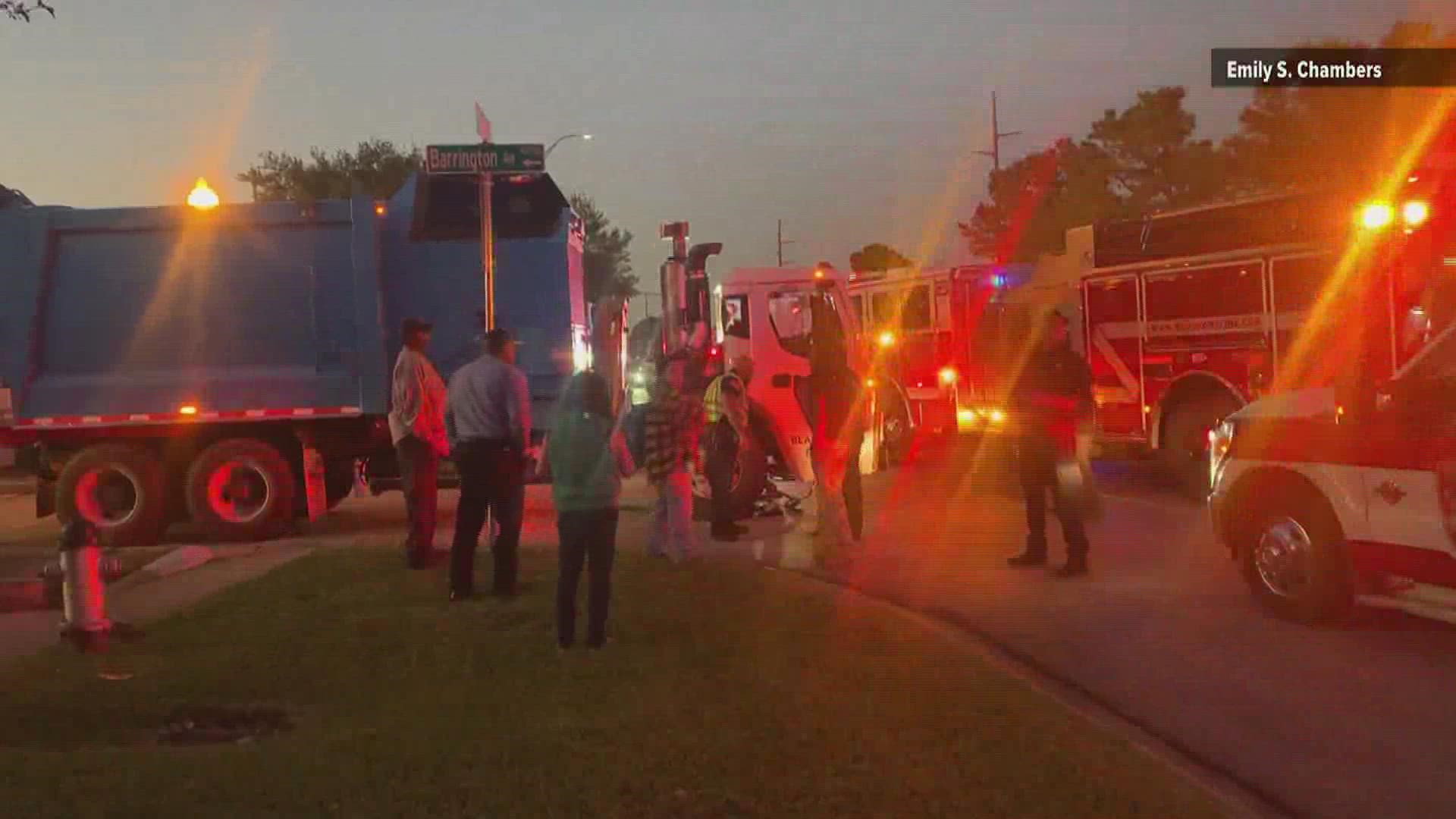 The bicyclist and driver of the garbage truck are both expected to be OK.