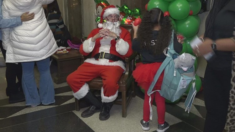 Jefferson County judges finalize 15 adoptions dressed as Santa and Buddy the Elf