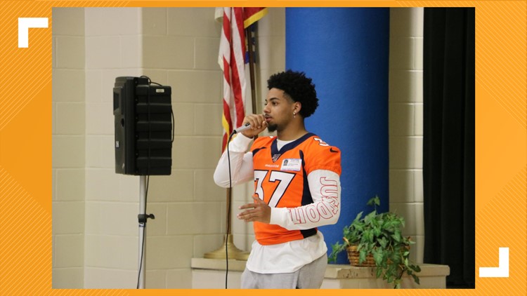 Denver Broncos P.J. Locke III returns to Dishman Elementary