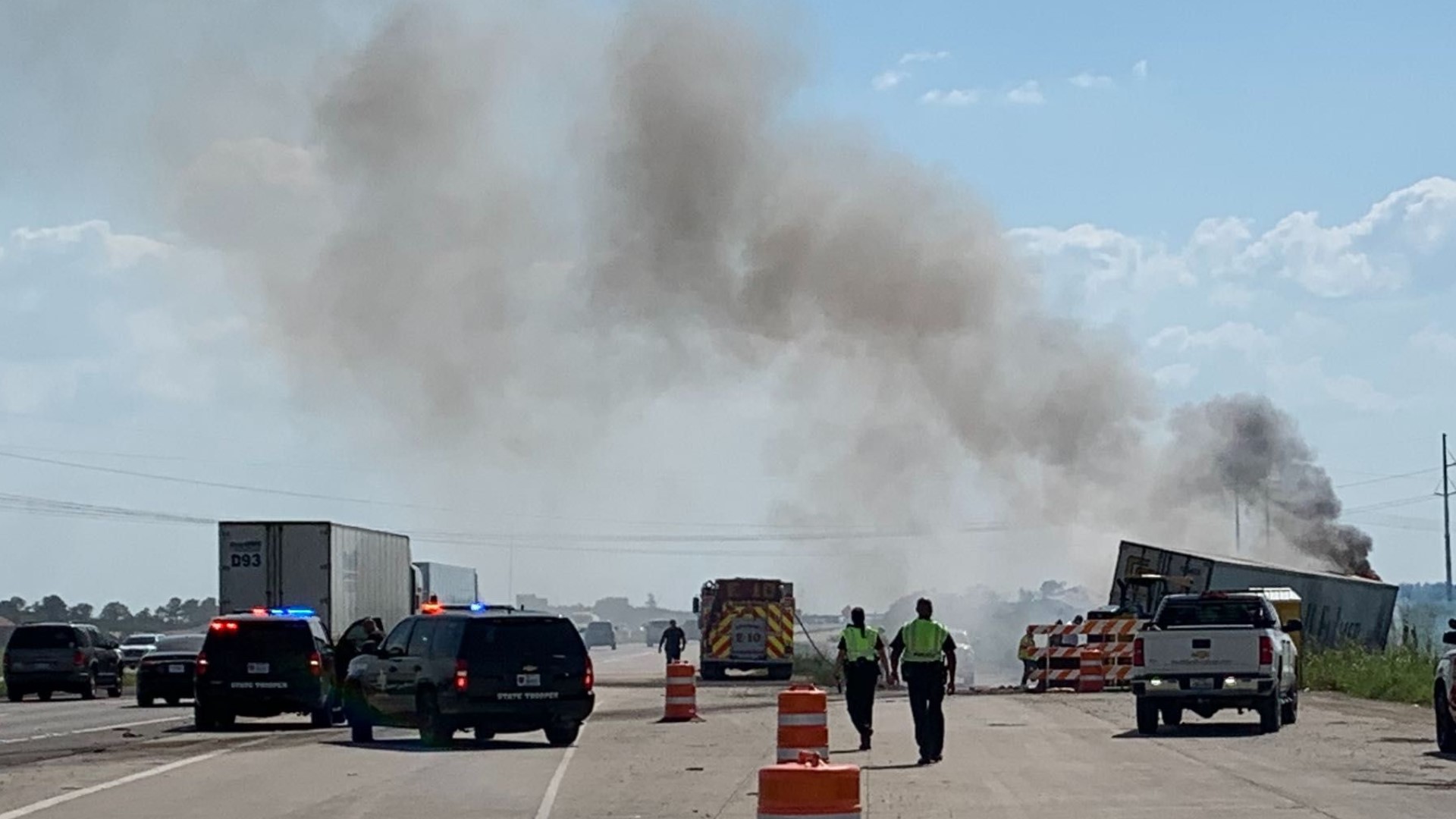 An 18-wheeler travelling in the westbound lanes near Major Drive got a flat tire, struck a barrier and then caught fire after leaving the highway according to a Texas Department of Public Safety trooper on the scene.