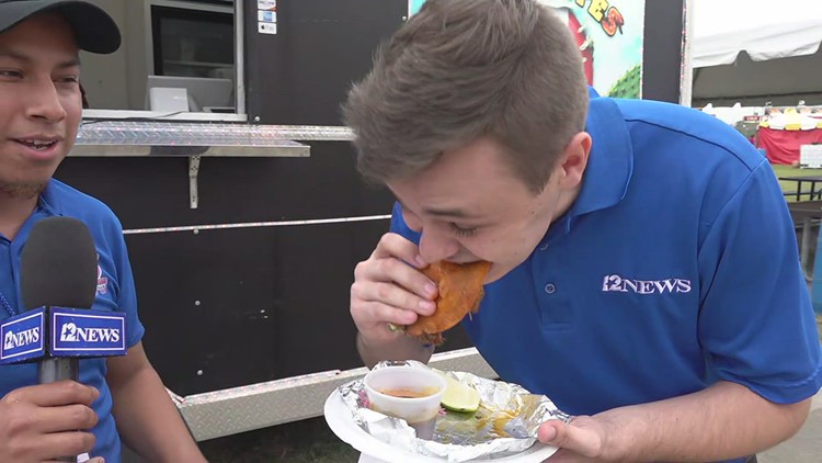 12News Reporter Cameron Sibert eats birria tacos from Los Molcajetes at the YMBL South Texas State Fair