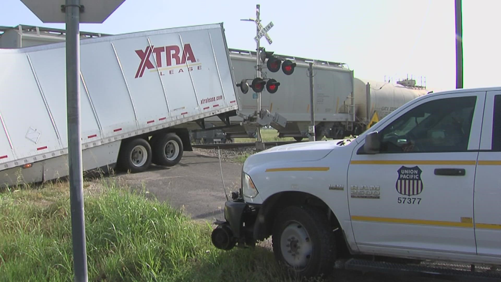 The trailer was struck at at the crossing at Thompson Road near China.