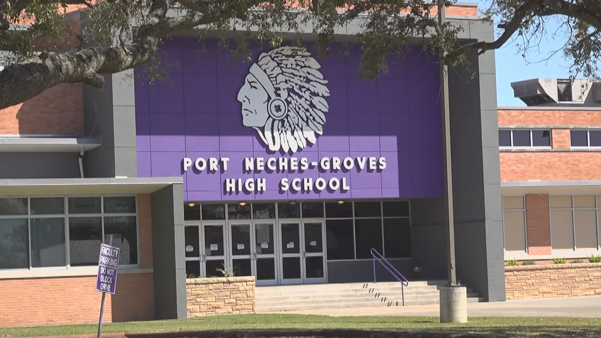 The man had the gun holstered when he arrived to the Port Neches Groves High School gym.