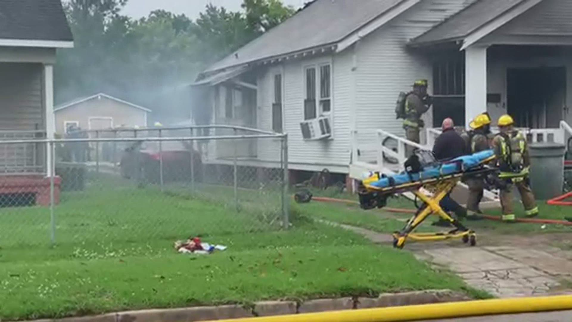 One of the men rescued from the fire was taken the hospital in critical condition.