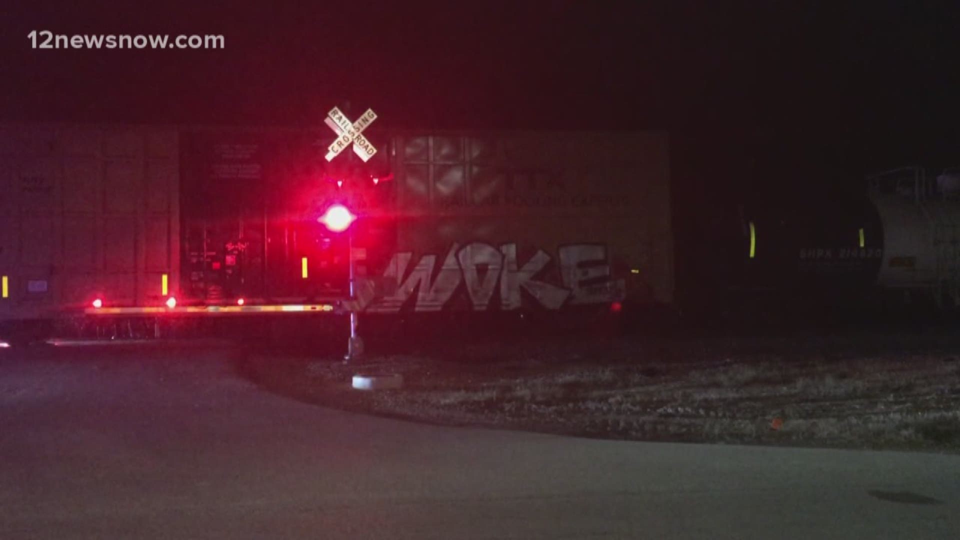 Two people were injured after a car was struck by a train at a crossing in north Beaumont.