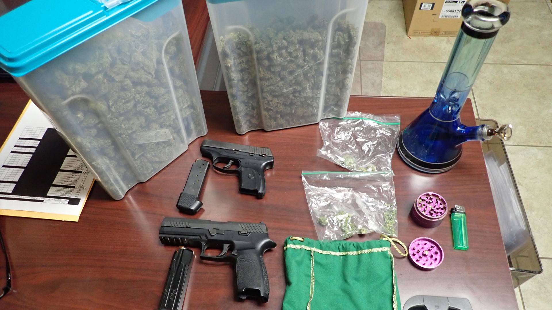 Orange County officials arrest 3 after finding marijuana and guns ...