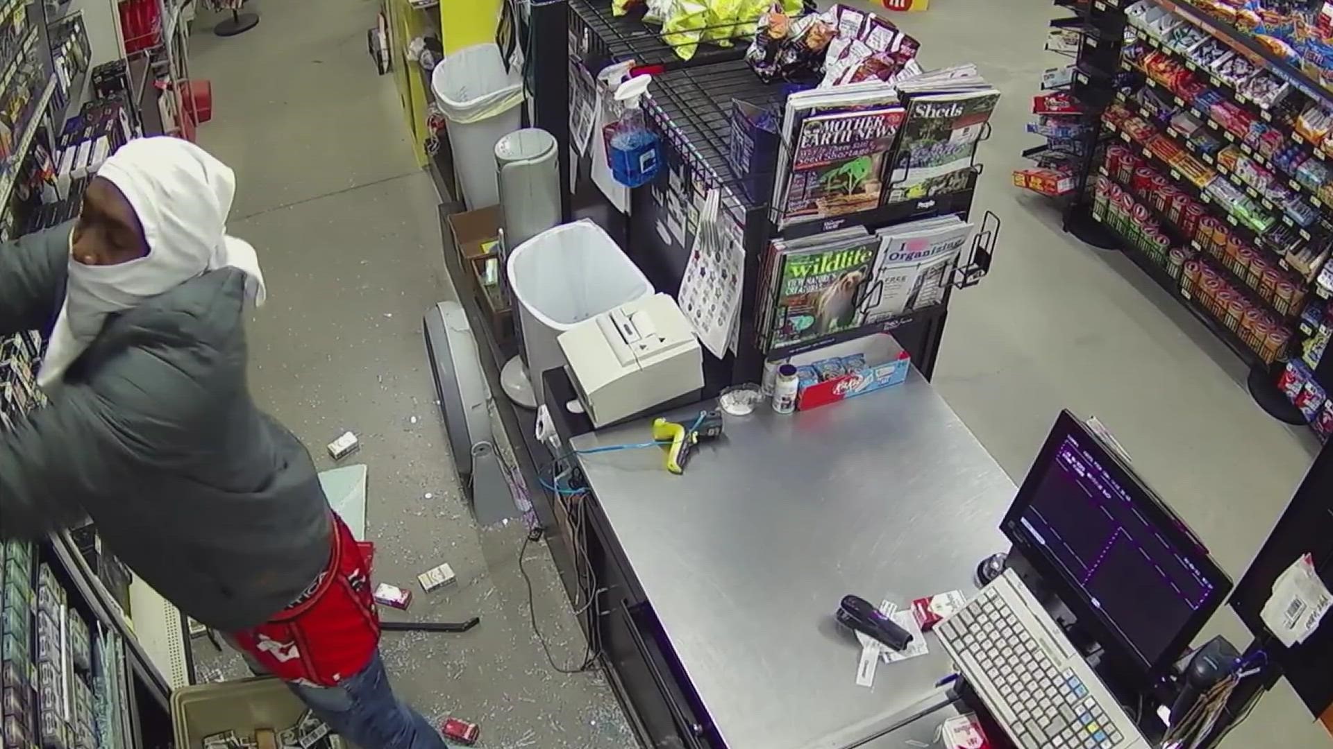 Two males were seen on surveillance footage breaking into the store and stealing items.
