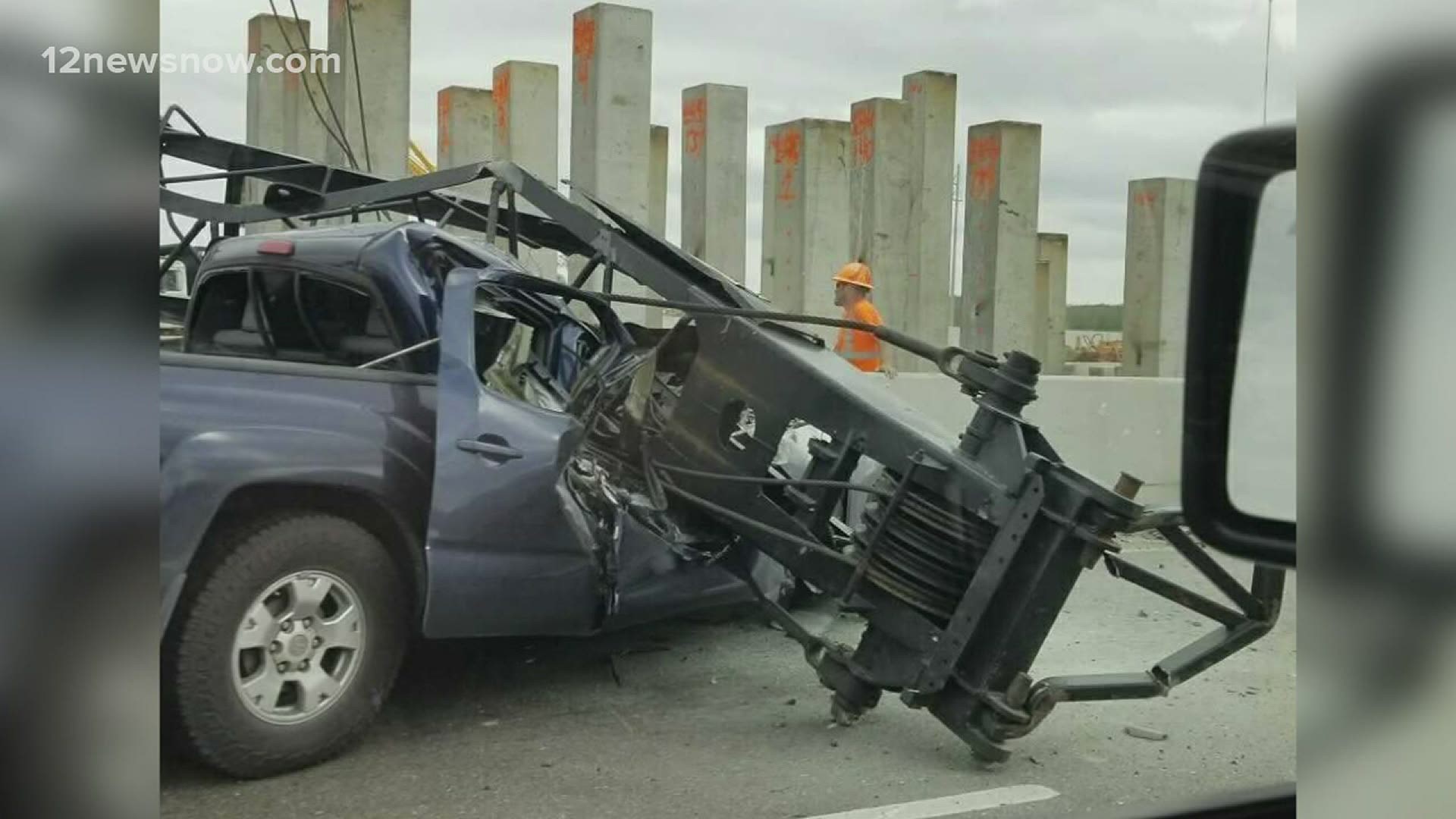 A crane fell on top of a pickup truck and killed two people on the highway Thursday afternoon.