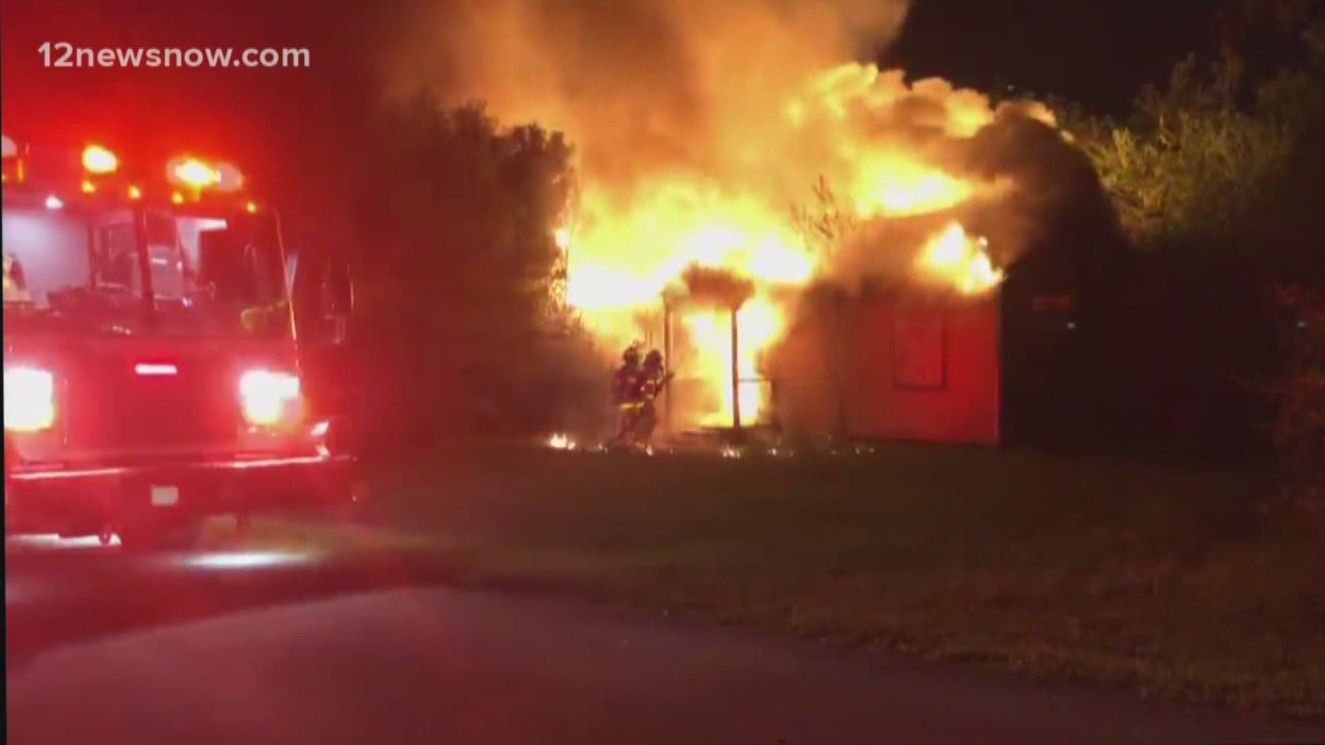 Crews battled the fire at the Massachusetts Street home on Saturday around 3 a.m.