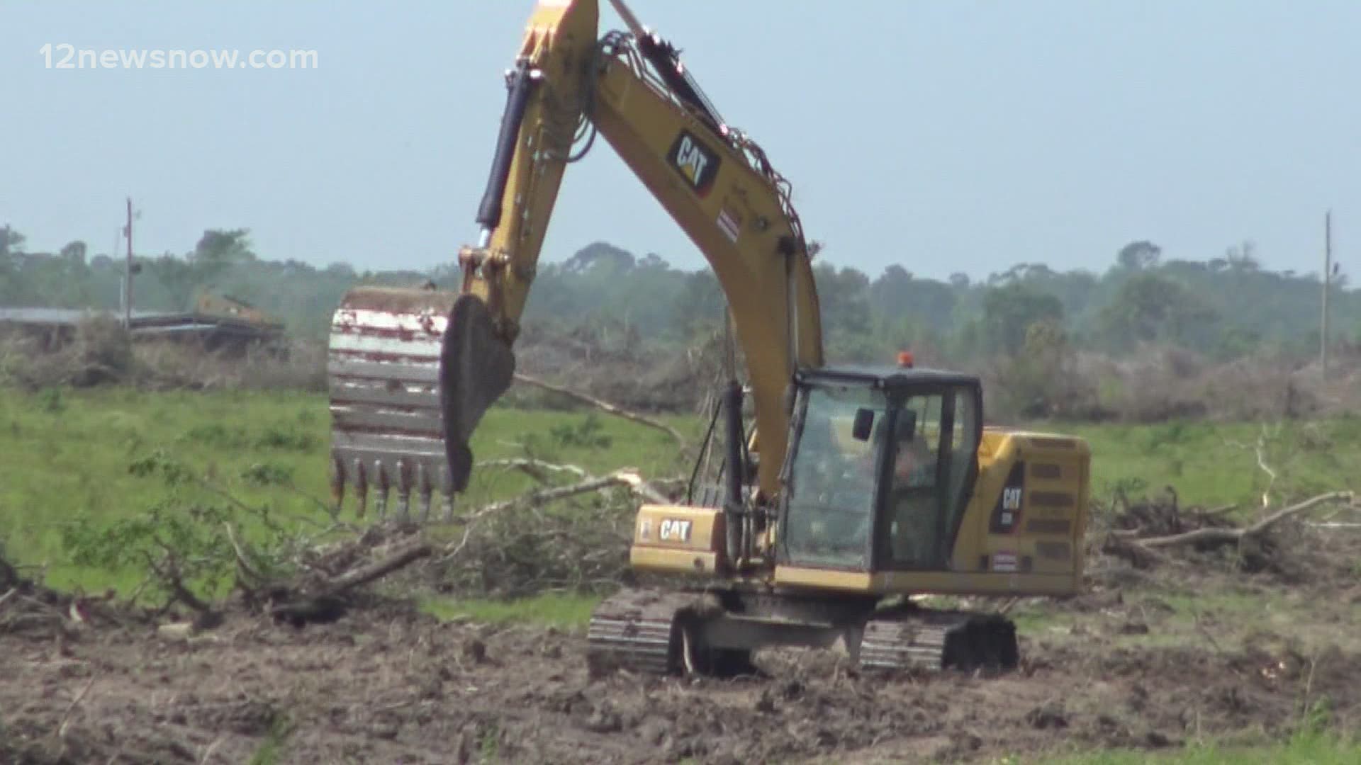 Land is currently being cleared near the site of a proposed $8 billion plant expansion in Orange County but officially the deal isn’t done yet.