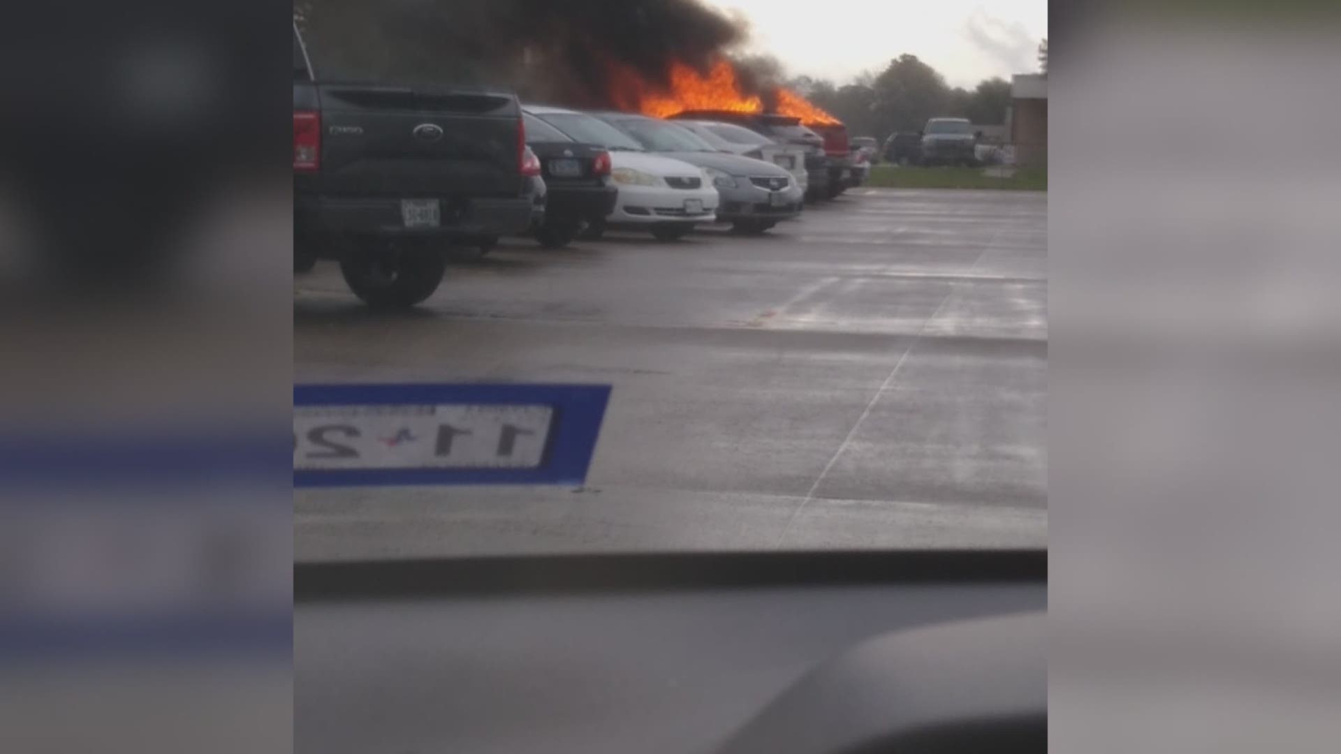 Investigations are underway after a car caught on fire in the Nederland HS parking lot.