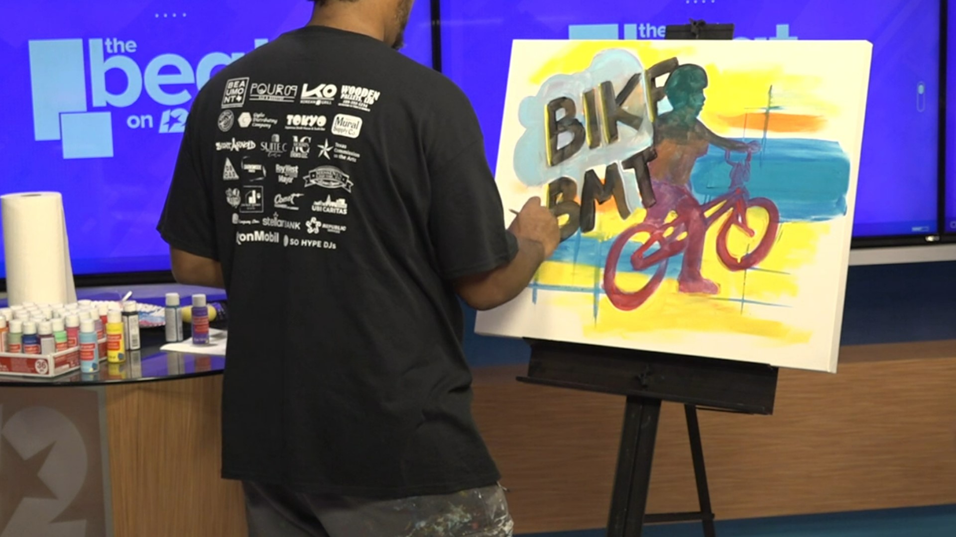 Carlos Zulu created a special painting in the 12News Studio during Thursday's live broadcast of "The Beat".