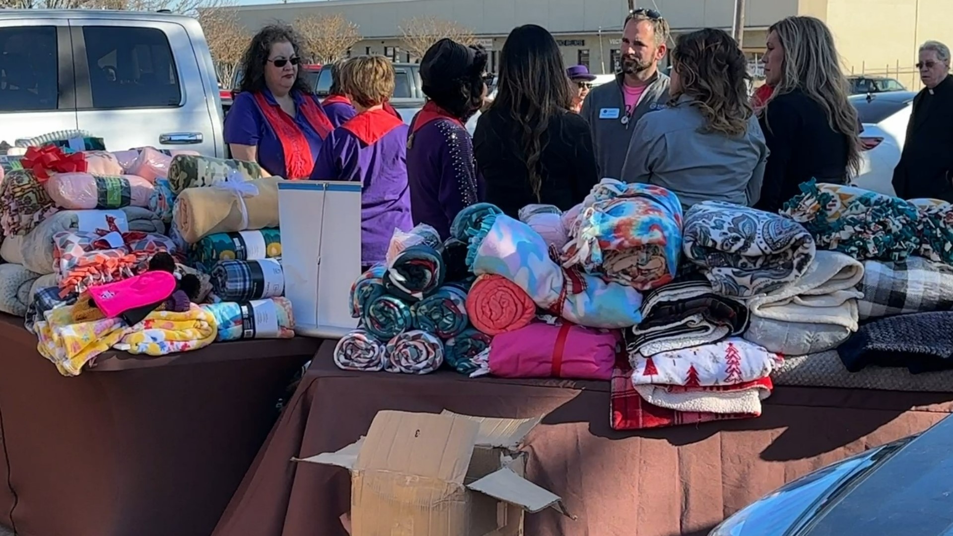 The Sabine Federal Credit Union and the Queenship of Mary # 2776 Catholic Daughters of America are making a blanket donation to the Women & Children’s Shelter.