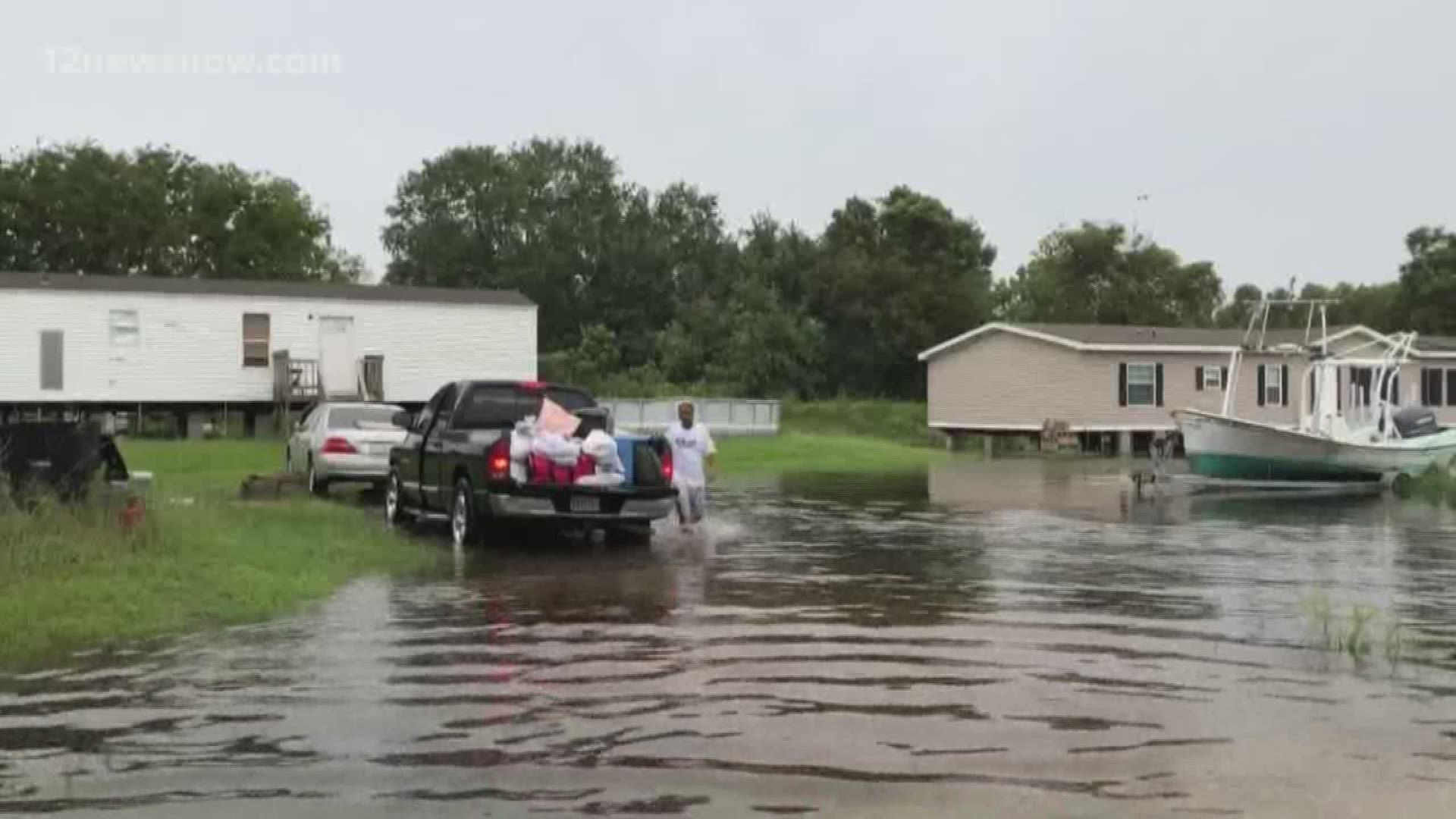 Evacuated residents are heading home, some finding their neighborhoods underwater.