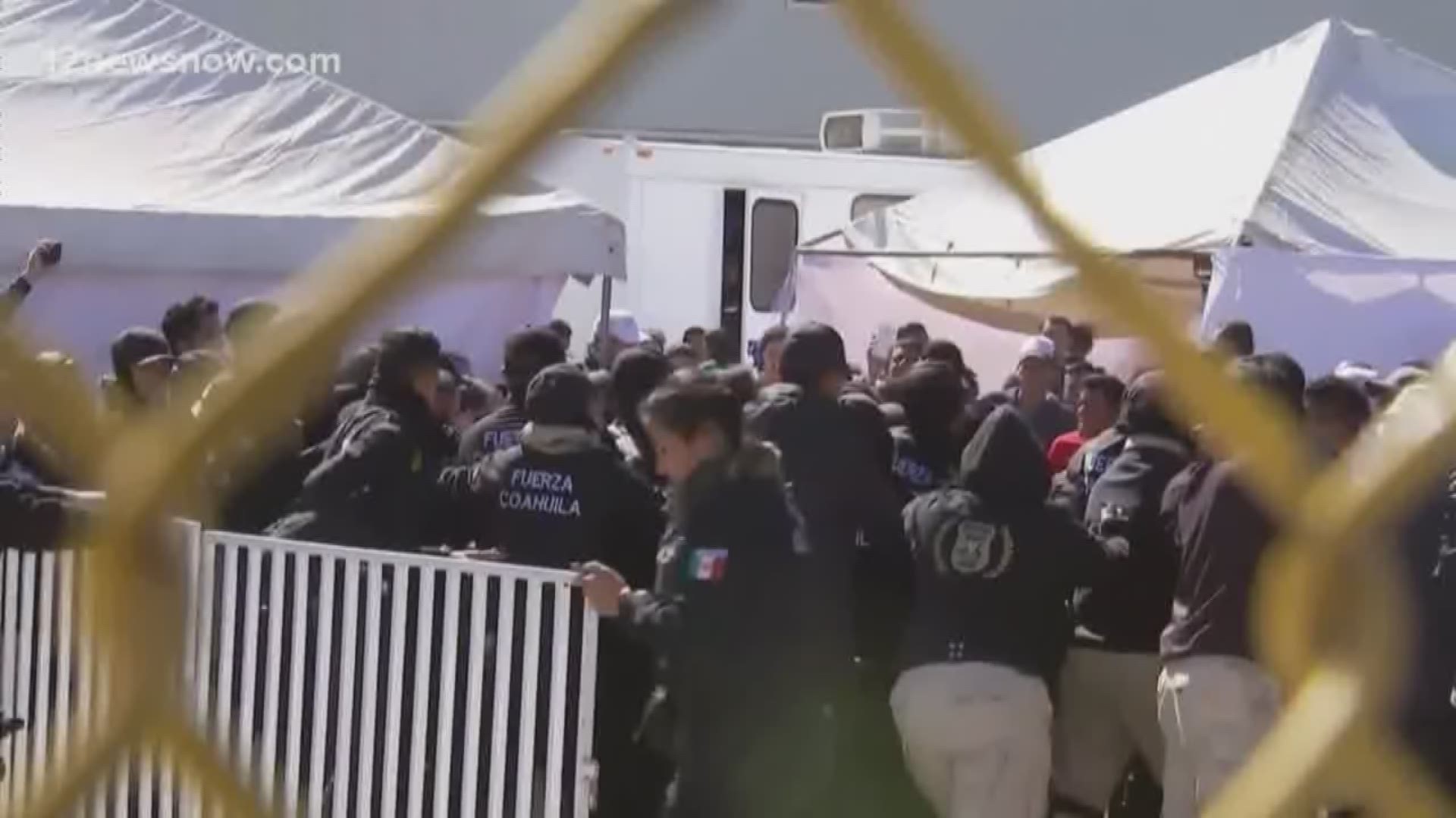 A large scene near Eagle Pass erupts as many migrants try to force their way past security barriers put up by Mecican authorities. There are no reported injuries.