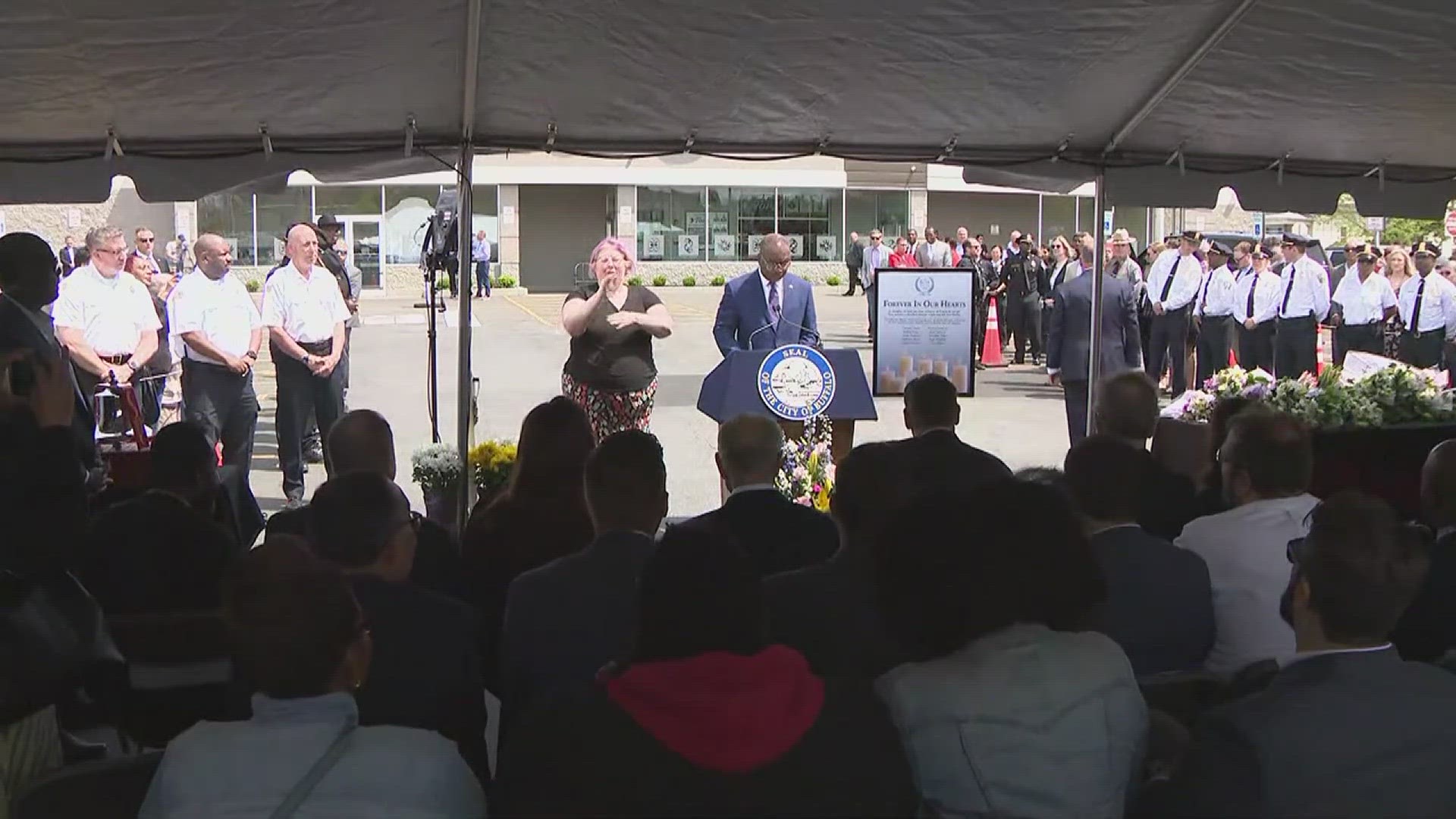 At the scene of the attack, officials paused to honor those who lost their lives.