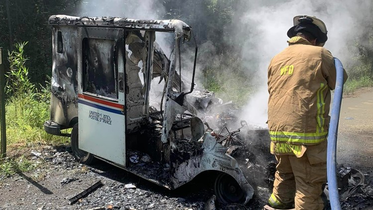 None injured after US Postal Service vehicle catches fire following Saturday accident