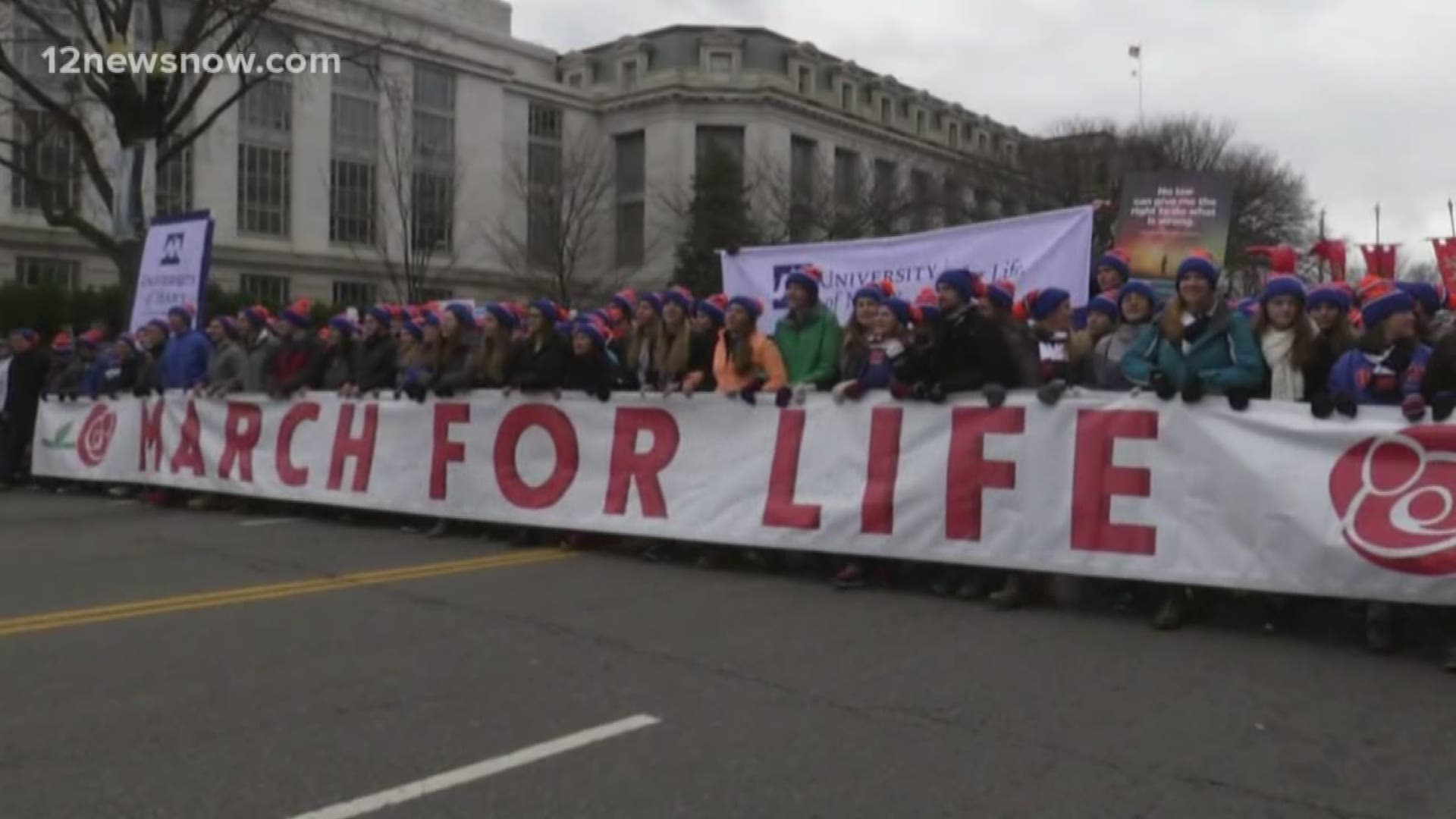 Thousands march to supreme court building in efforts to end abortion.