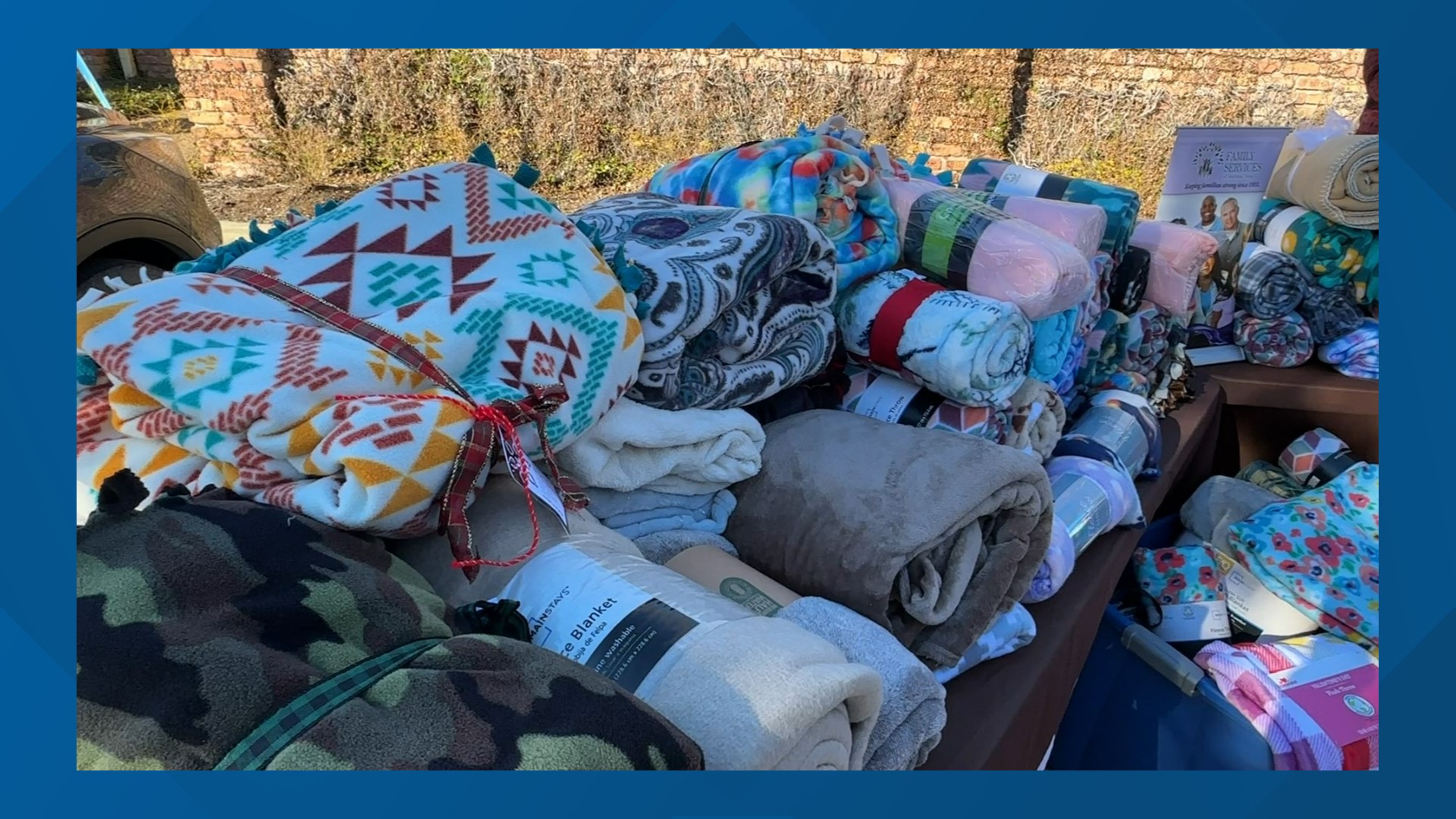 Credit union donates blankets to local shelter | 12newsnow.com