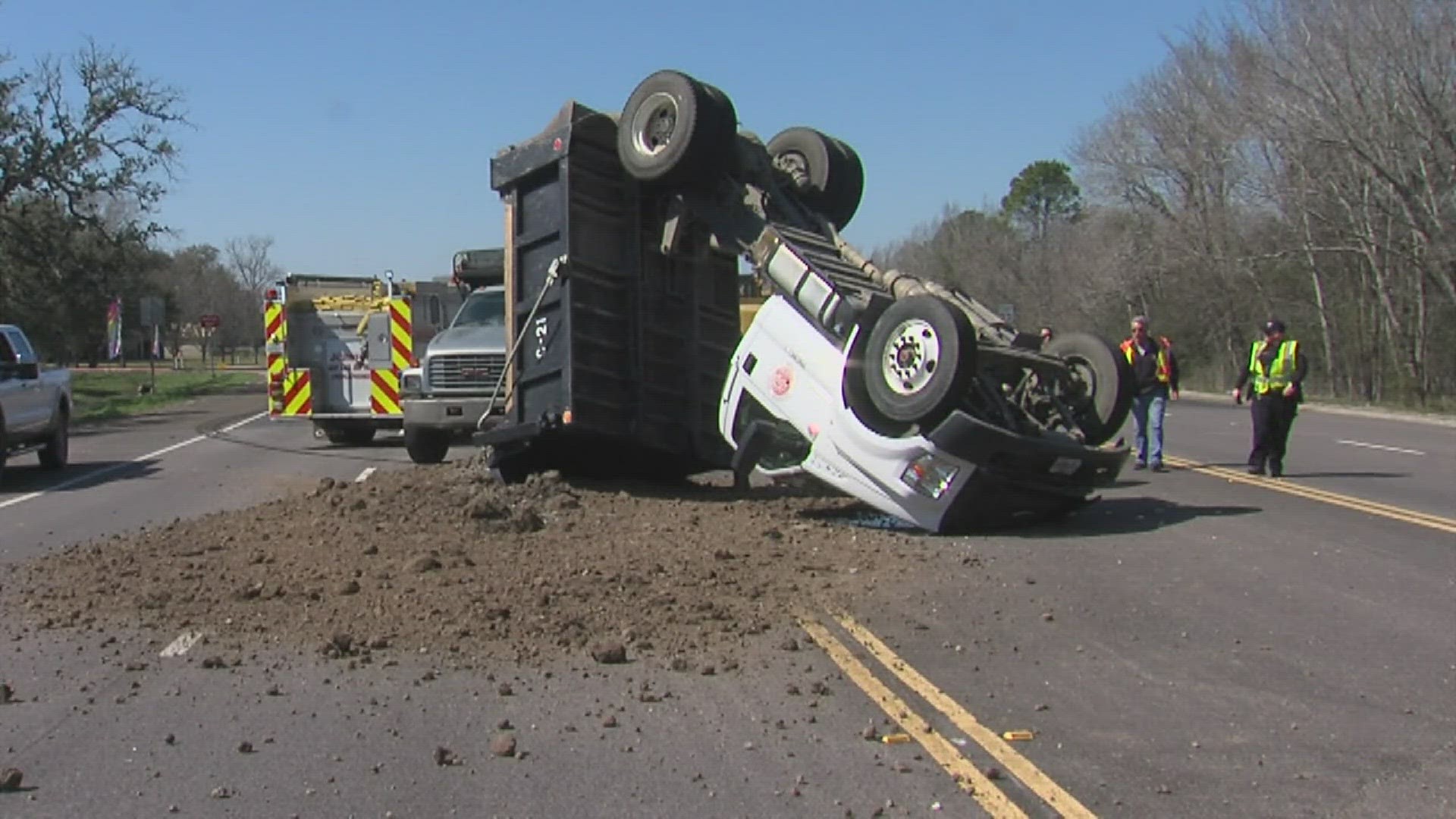 The driver appeared to be conscious and alert when he was taken by ambulance to a Southeast Texas hospital.