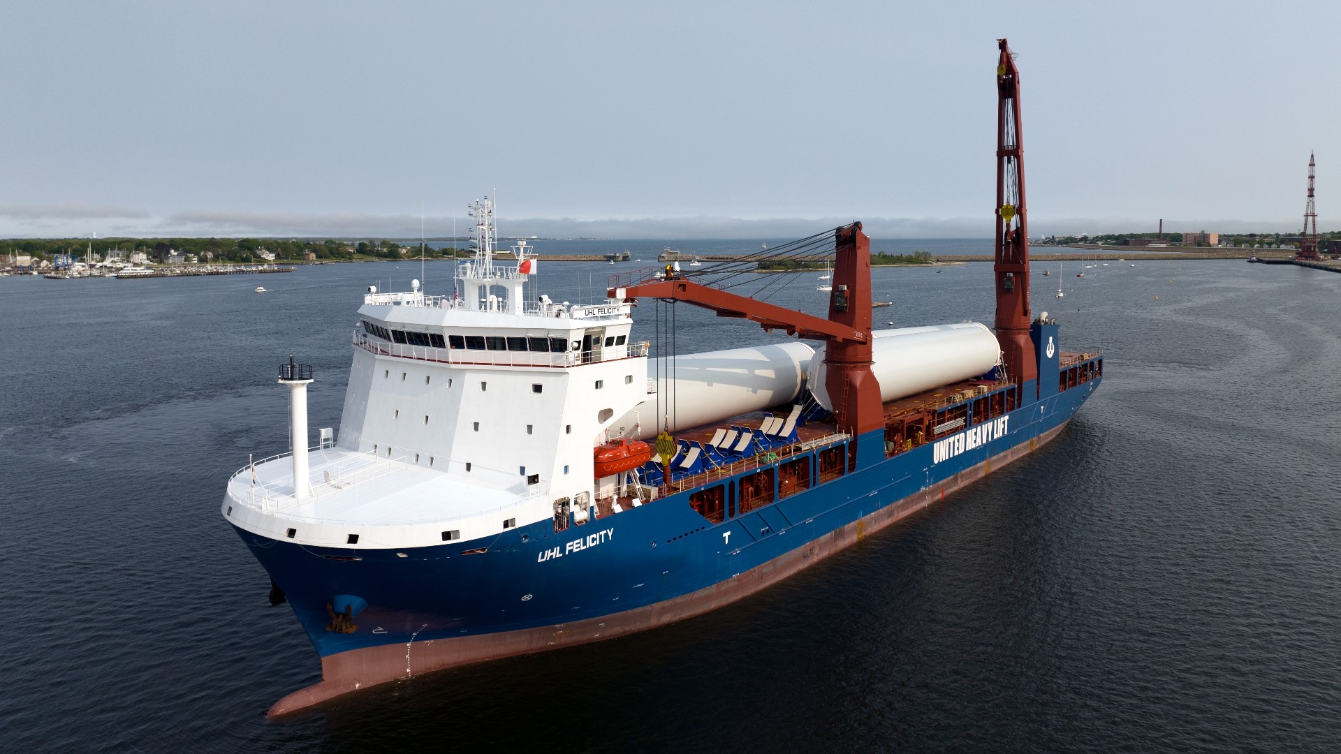 A vessel carrying wind turbine tower sections reached the Port of New Bedford.