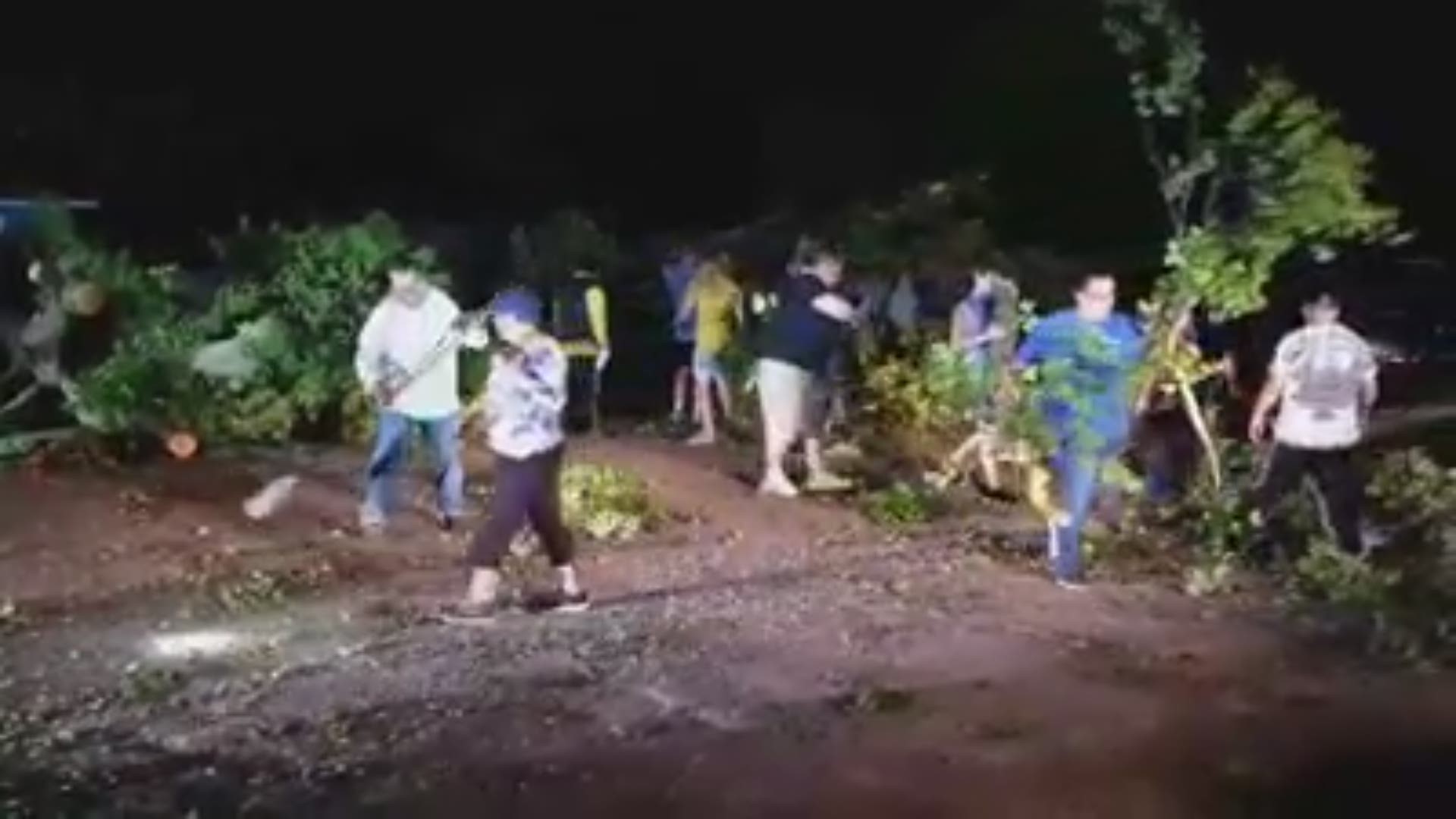 Neighbors in Hilltop and Murray cleaned up the area after storms scattered debris all over the city Sunday night.