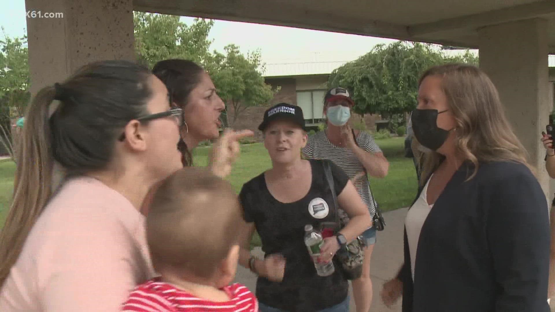 The event abruptly ended after anti-maskers shouted down participants.