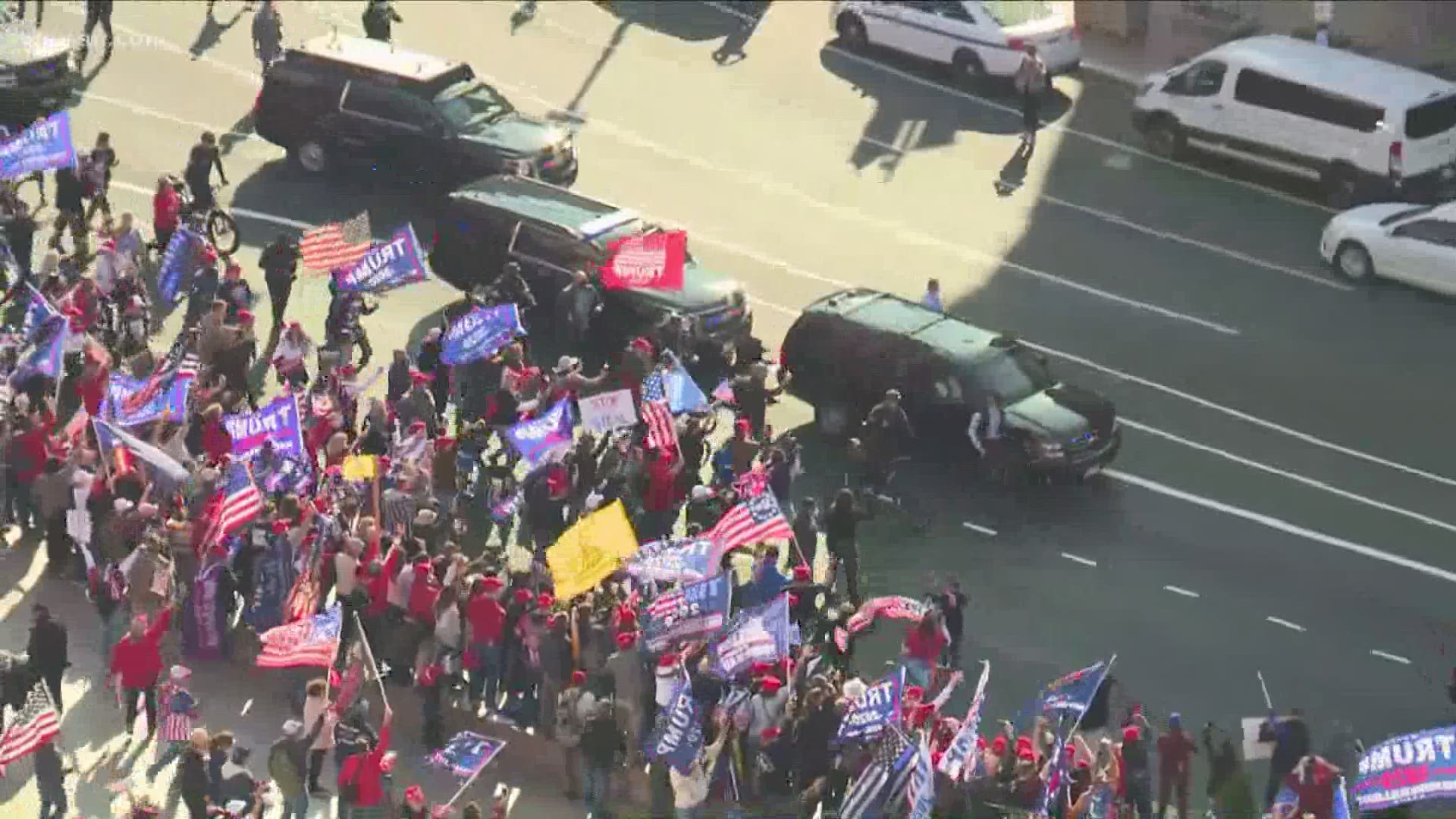 A motorcade carrying what appeared to be President Donald Trump made a loop around Freedom Plaza to wave to supporters Saturday