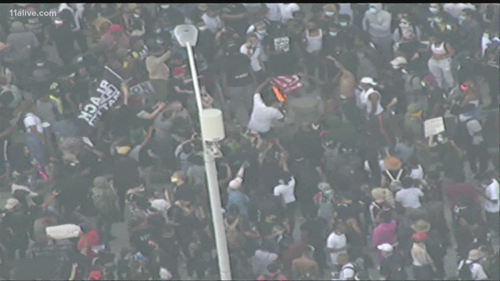 Large crowds remain in downtown Atlanta protesting the death of George Floyd at police hands in Minneapolis.